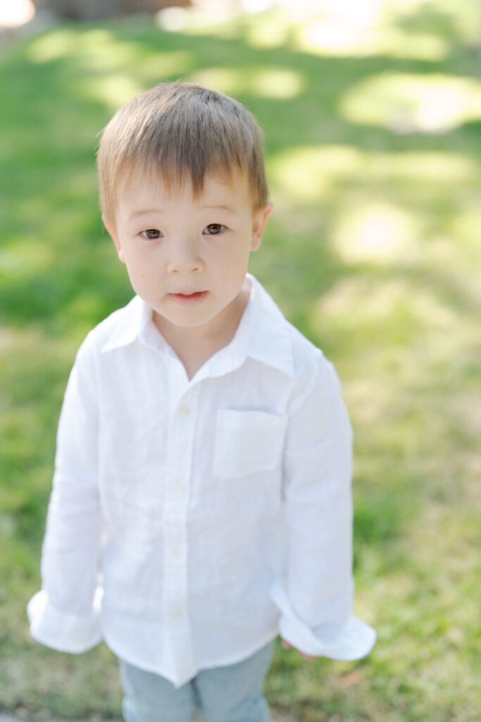 Innocent-looking baby boy with adorable eyes looks at Robin Jolin.