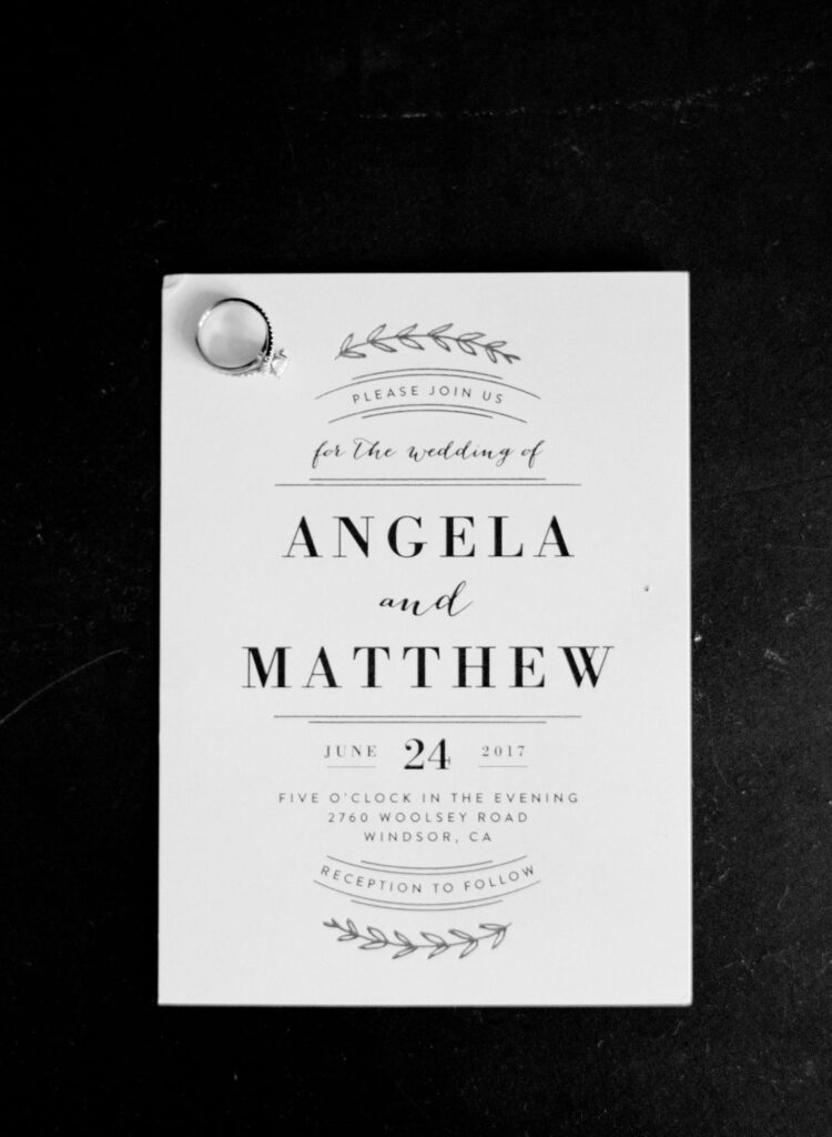 black and white image of an invitation to a wedding. 