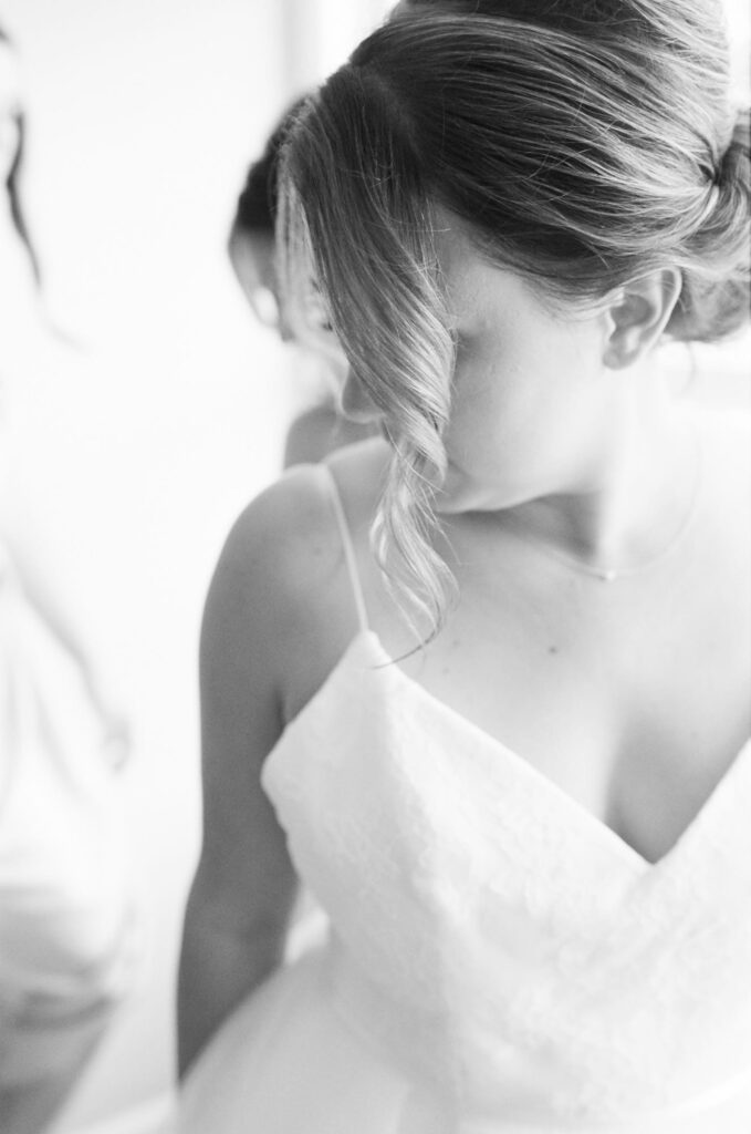 Aesthetic image of a bride in white wedding gown.