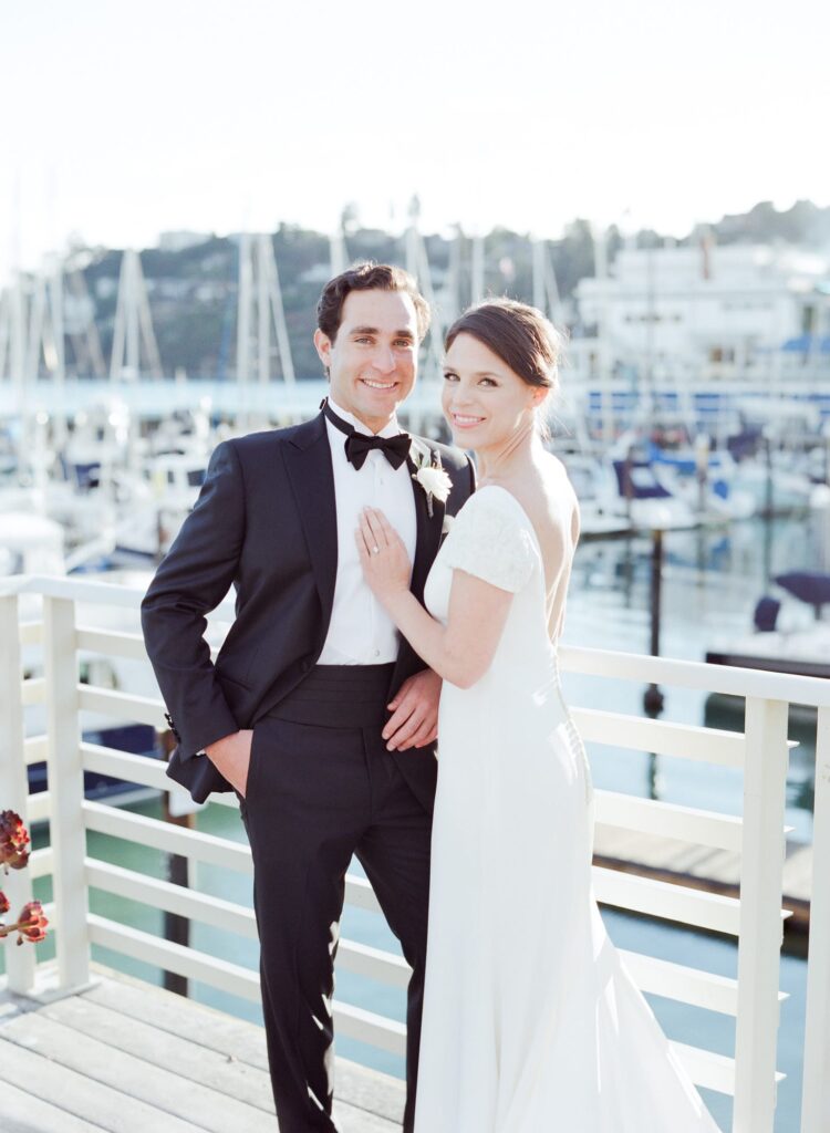 Bride and groom pose for the camera at their Tiburon Destination Wedding