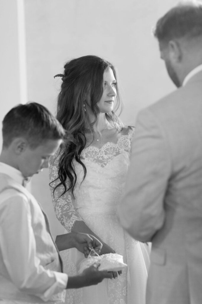 Little boy helps the bride and groom with wedding processions.