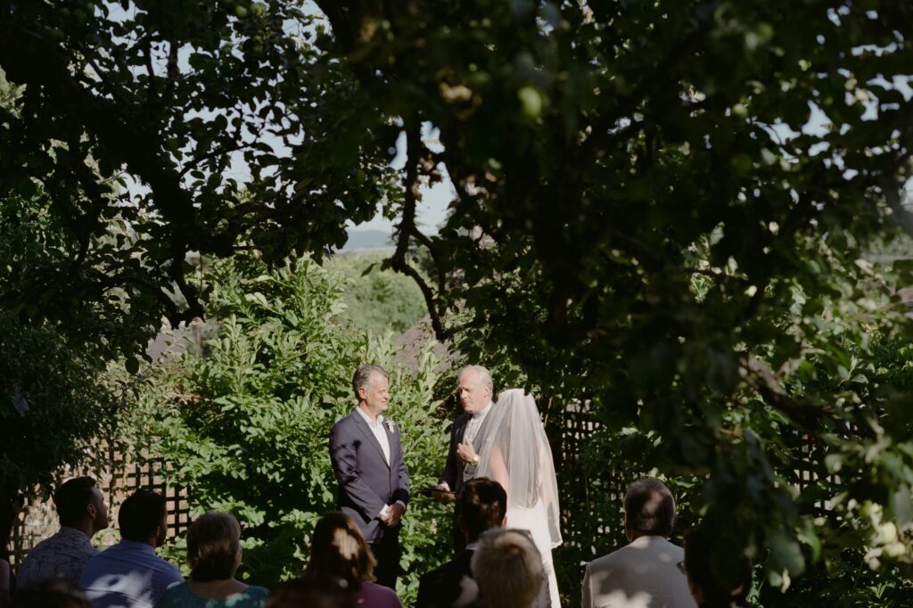 Bride and groom exchange wedding vows at a San Juan Island Wedding