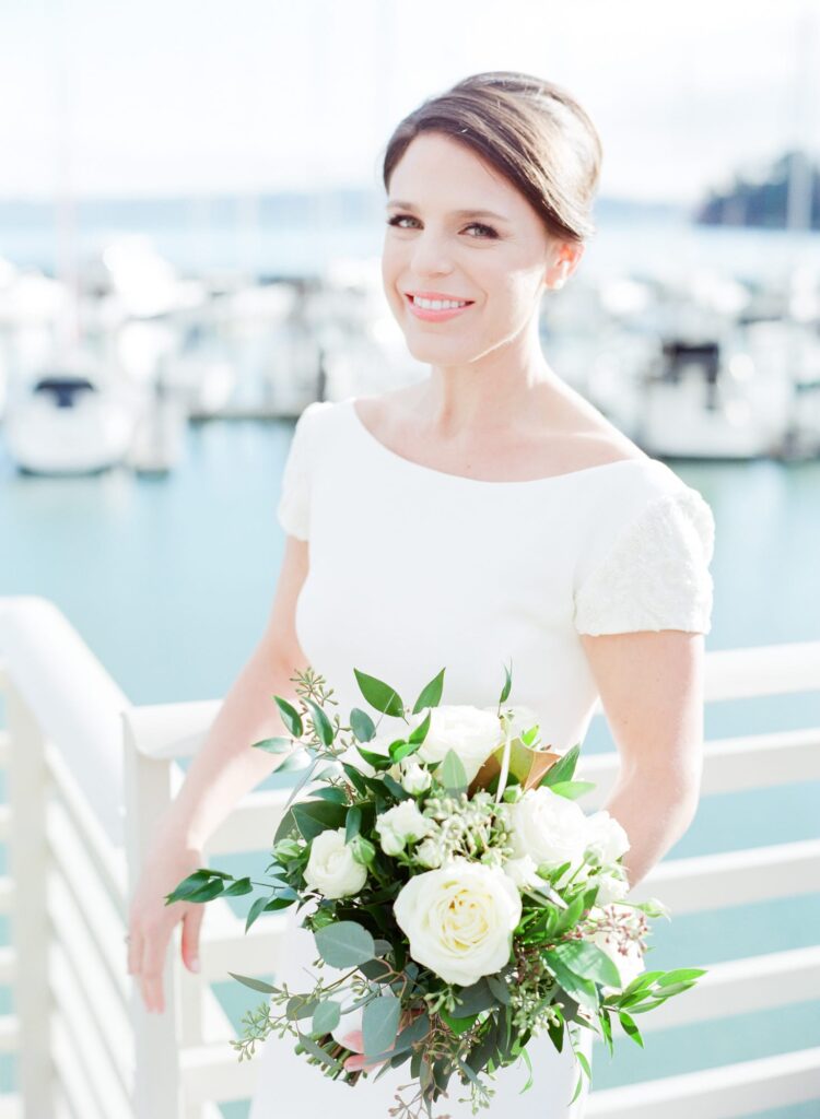 Bride holds a white flower bouquet at her Tiburon Wedding.