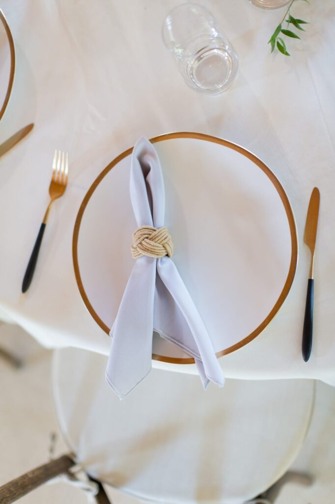 Wedding reception dining table arrangement.