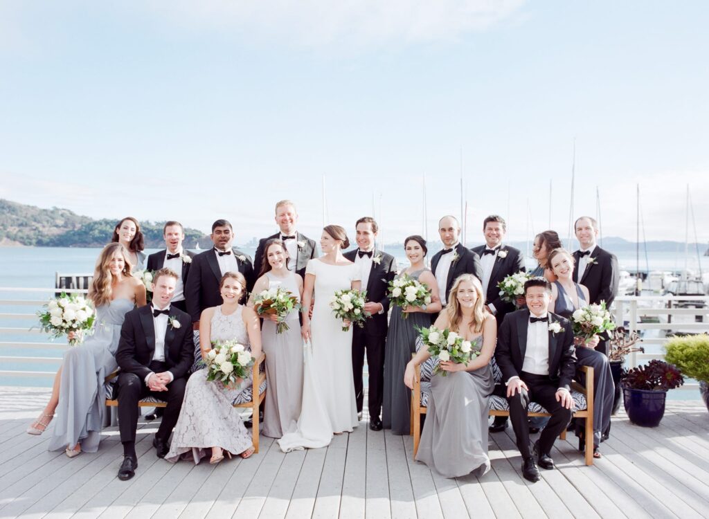 Bride and groom with their maids and best men at their Tiburon Destination Wedding venue.