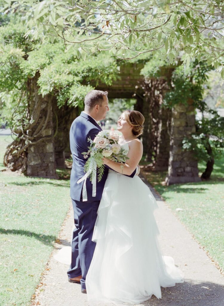 Newlyweds at a Piedmont Wedding embrace at the garden.