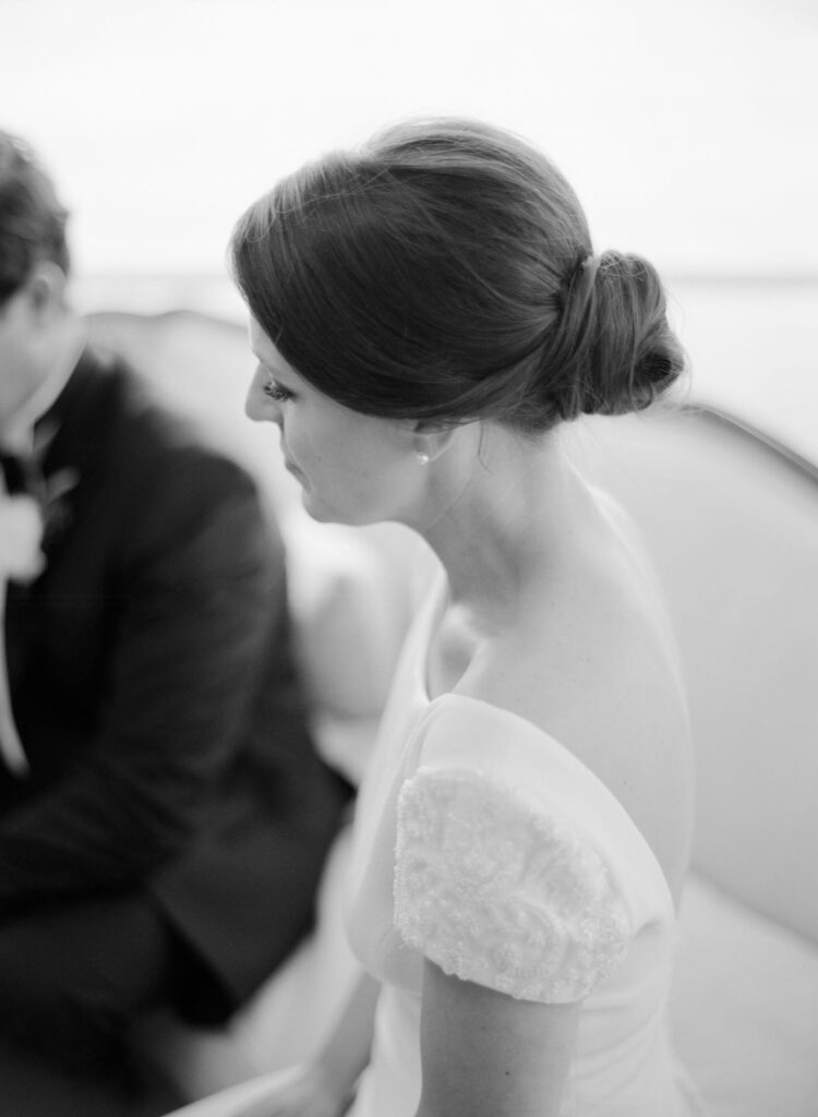 Side angle shot of a bride at her wedding ceremony.