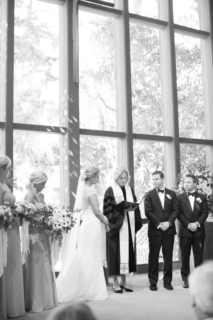 Officiator reads the notes to guide the wedding ceremony.