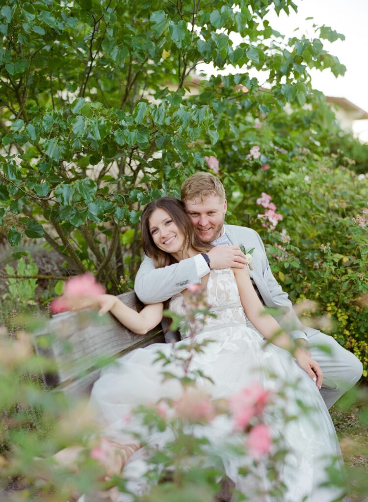 After-wedding garden photoshoot of bride and groom by Robin Jolin.