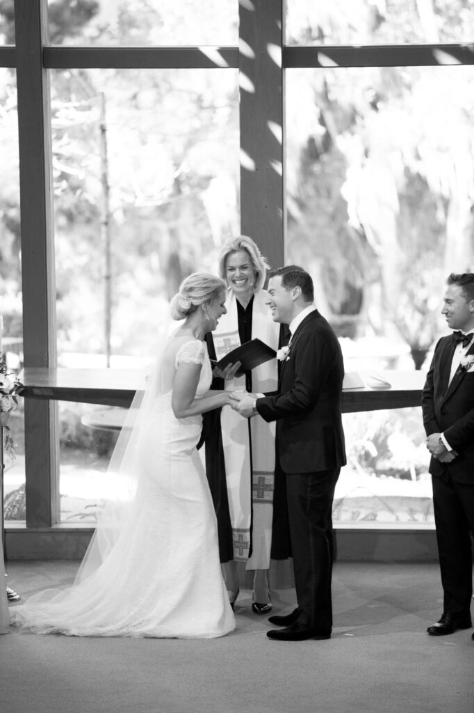 Wedding vows exchange between the bride and groom.