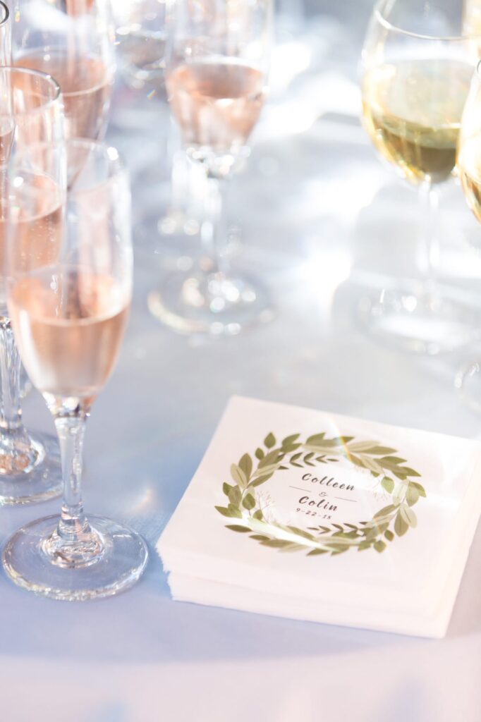 Champagne glasses at a white tabletop.