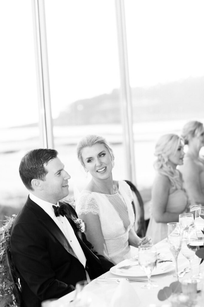 Bride looks lovingly at her groom.