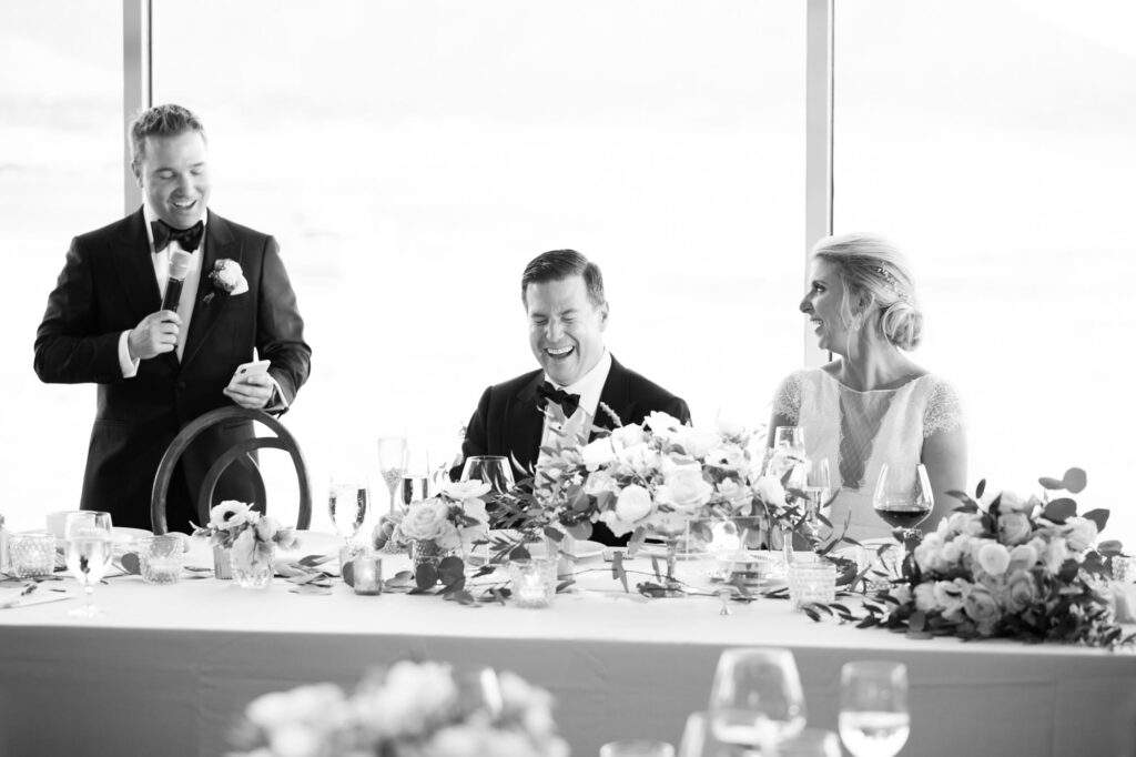 Bride and groom share a laugh at their afterparty.