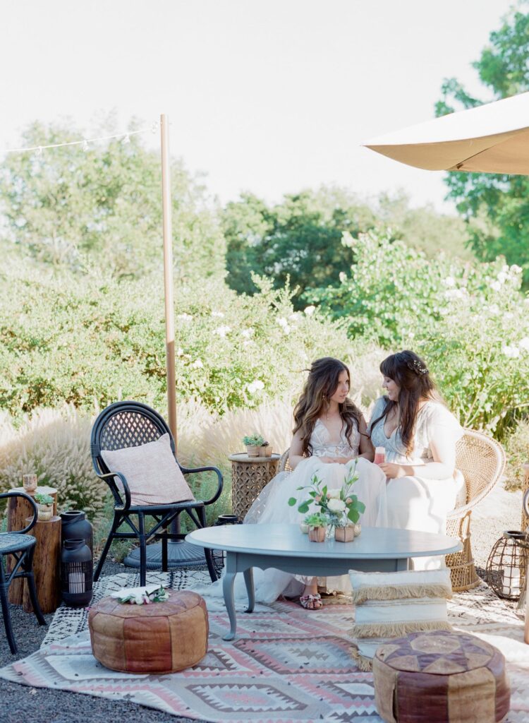 Bride consults with her bridesmaids during her wedding.