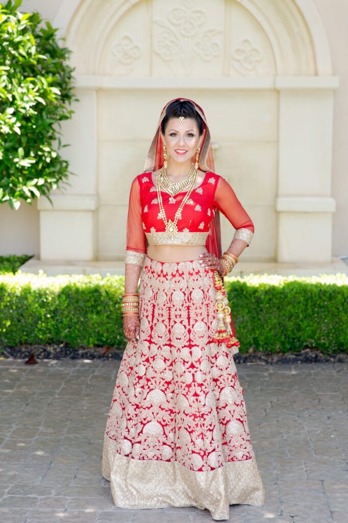 Bride-to-be in her red wedding dress.