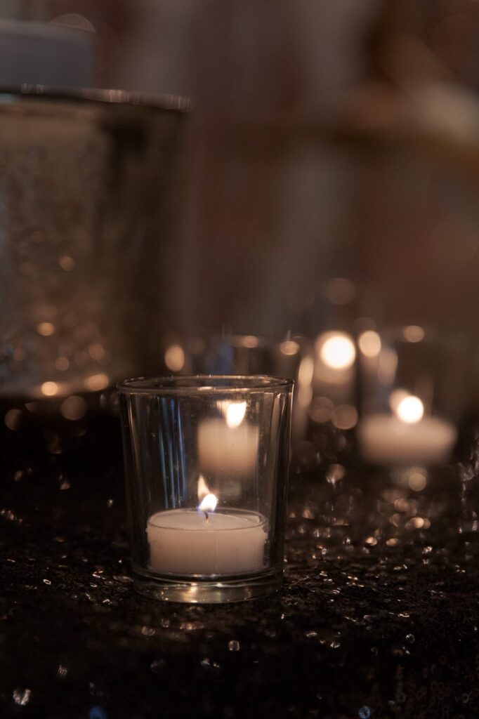 Elegant candle inside a glass cup.