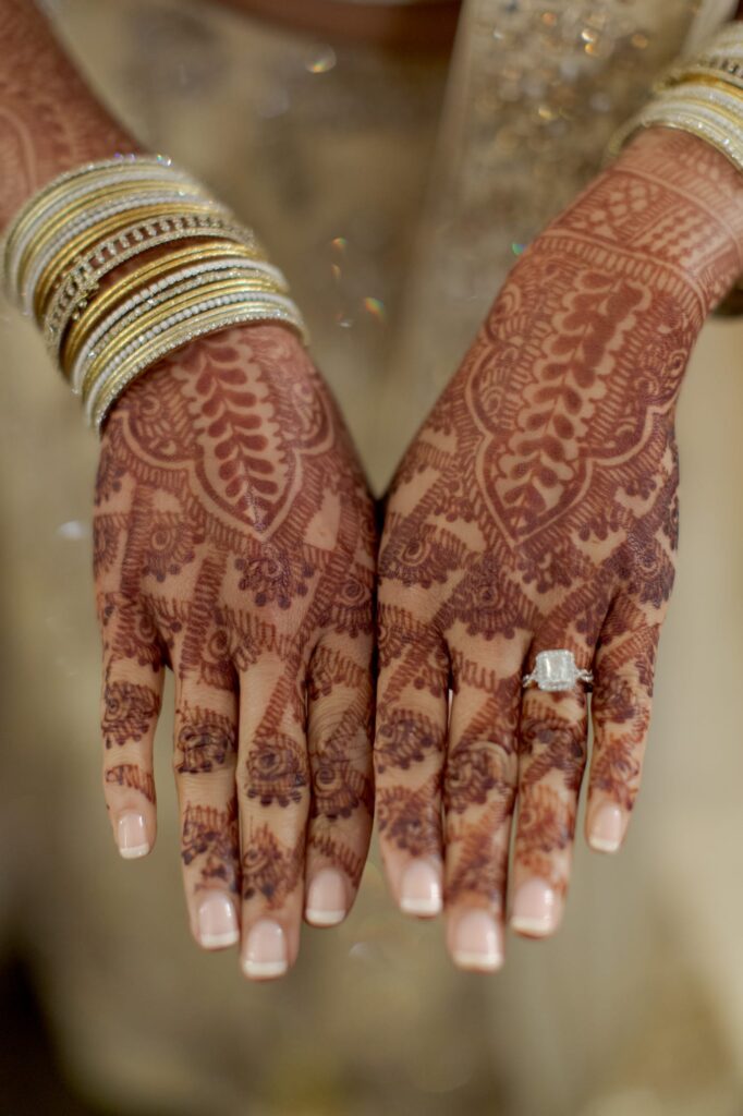 Bridal mehendi with wedding ring.