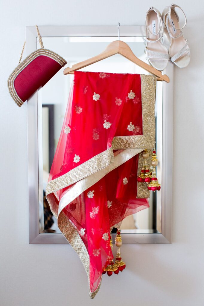 Red Indian wedding gown, purse, and sandals.