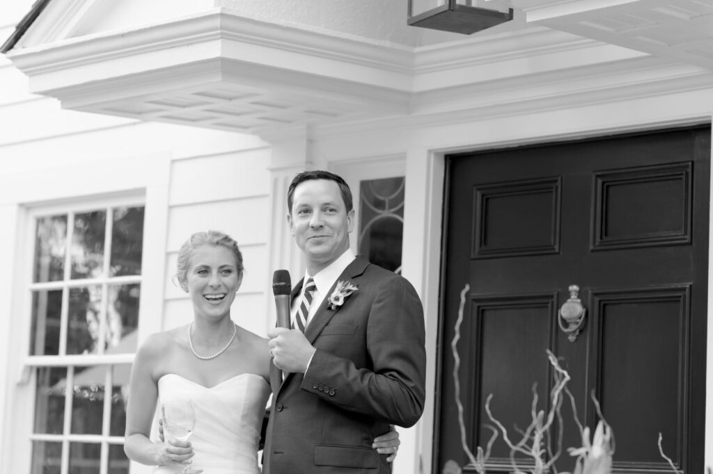 Newly pronounced husband and wife address their guests.