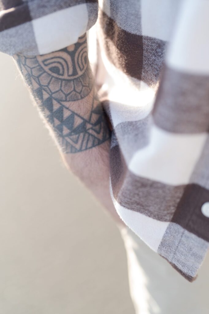 Male arm tattoos