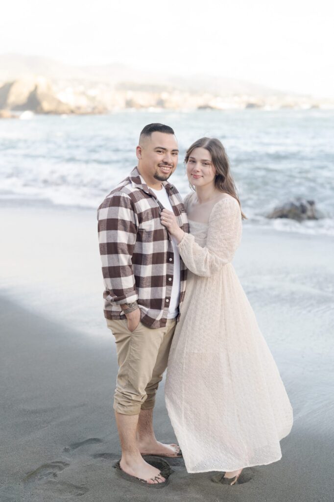 Newly engaged couple pose for Robin Jolin's camera at Bodega Bay.