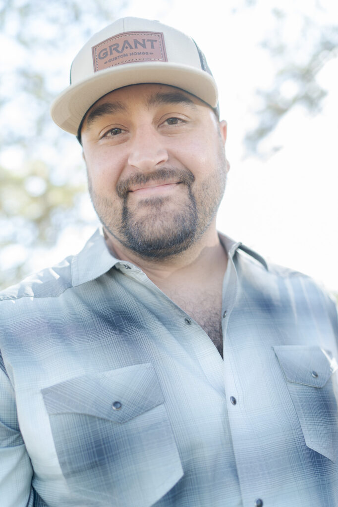 Portrait of a middle-aged man wearing a "Grant" cap.