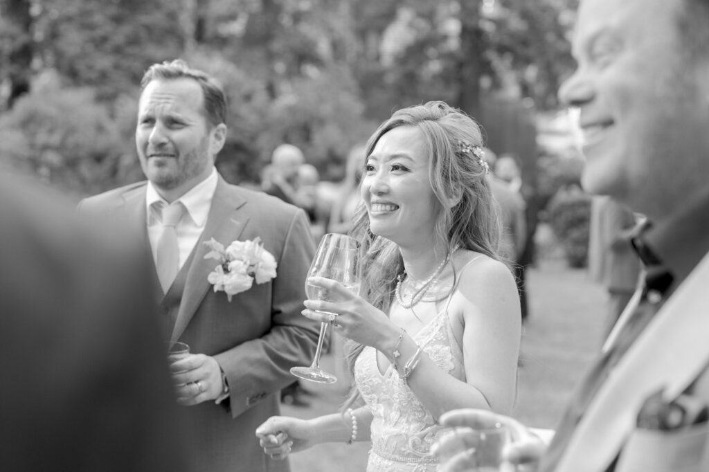 Bride and groom spend time with their guests at the cocktail hour.