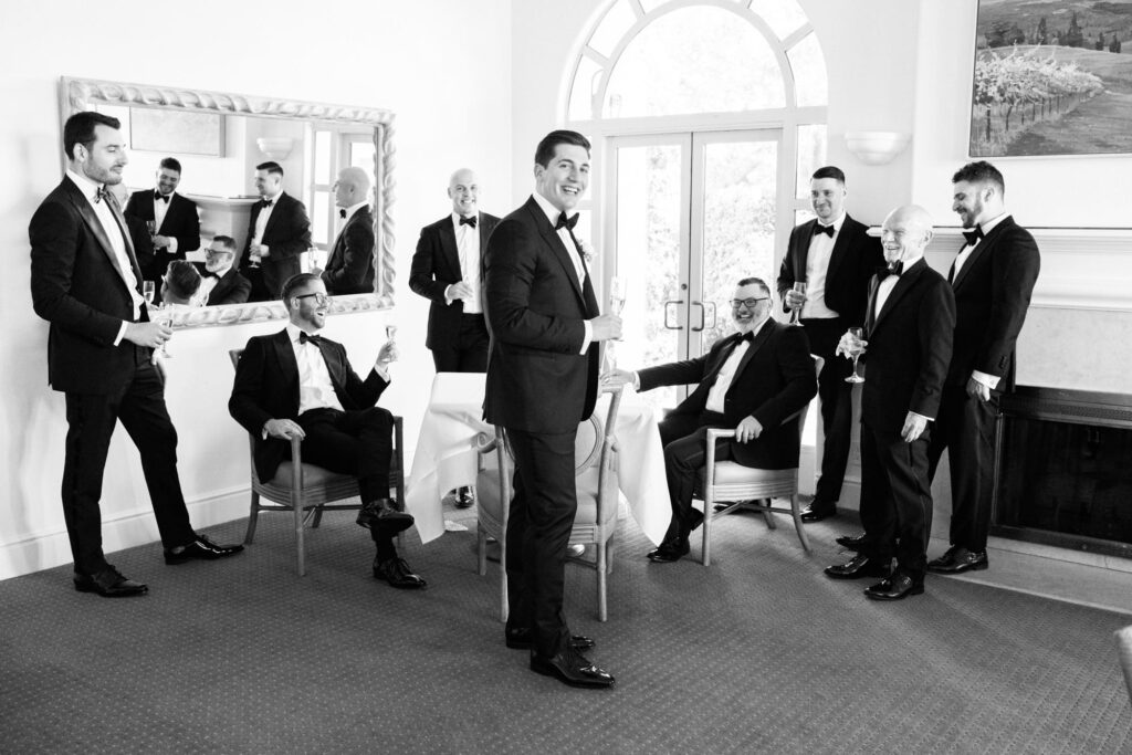 Bridegroom and his male guests relax before the wedding officiation ceremony.