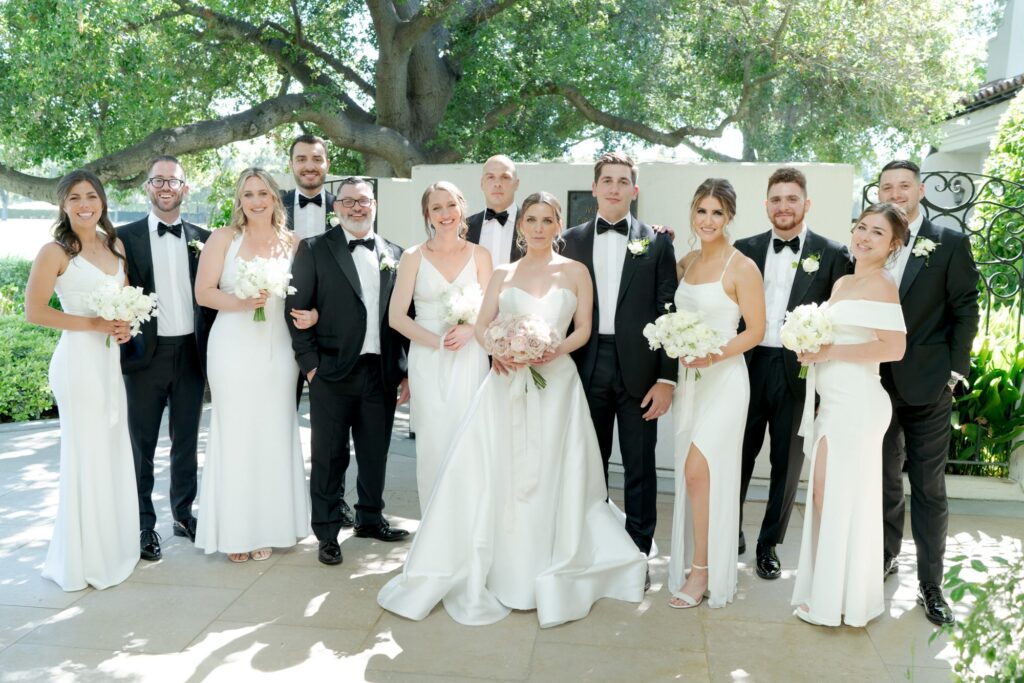 Group reunion of the bride, groom, bridesmaids, and best men.