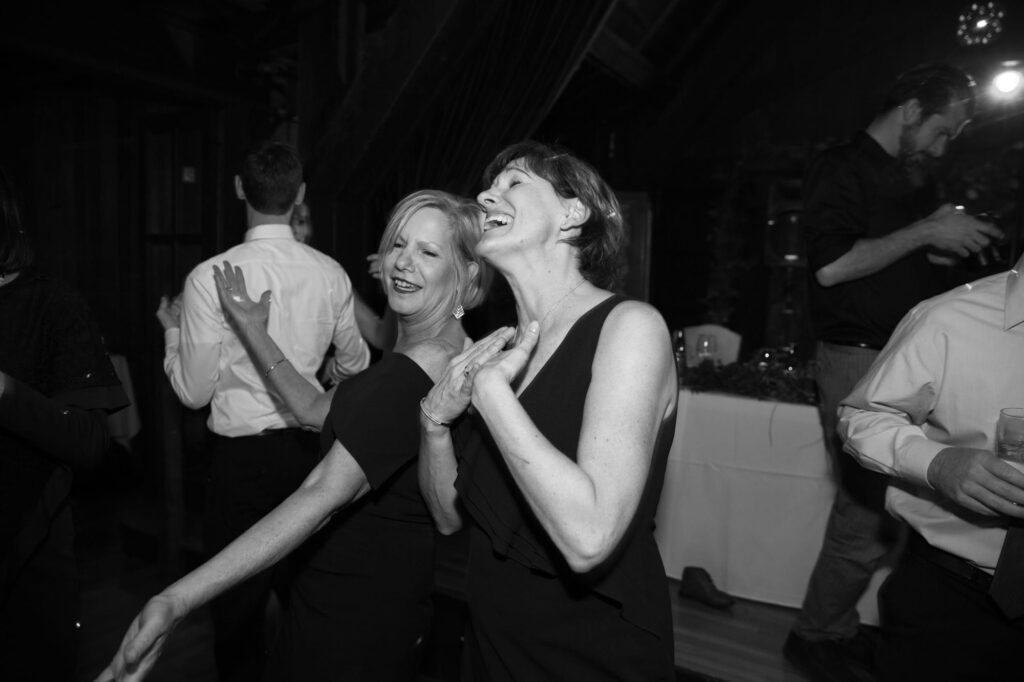 Older women dance at the afterparty.