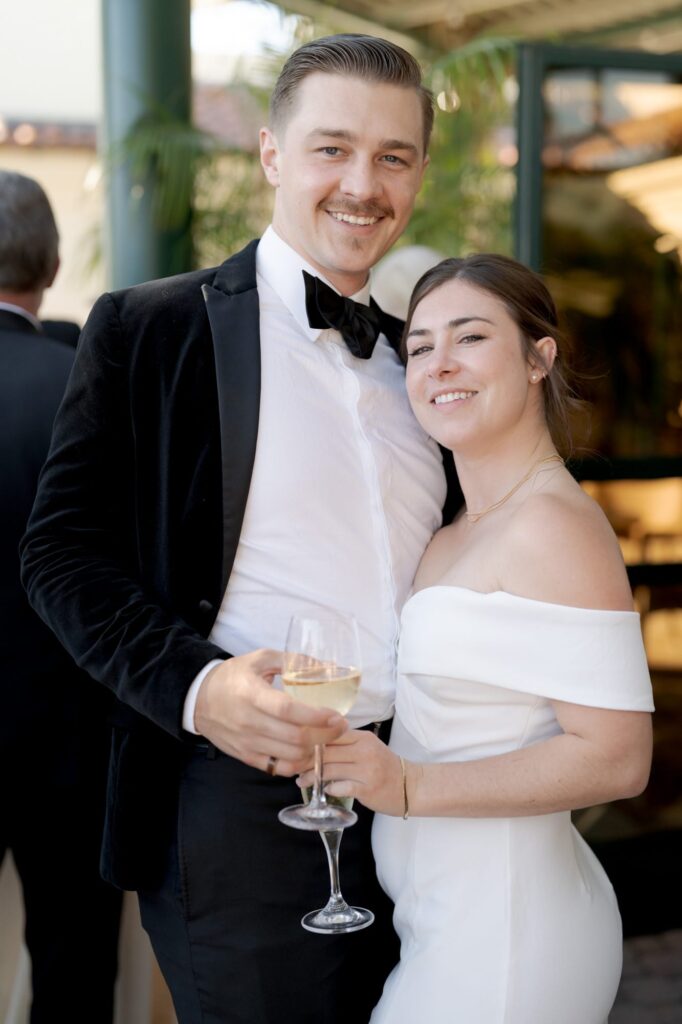 Wedding guests relax at the cocktail hour.