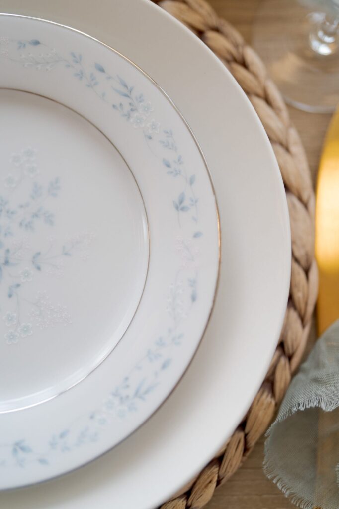 Elegant floral patterns on a white porcelain plate.